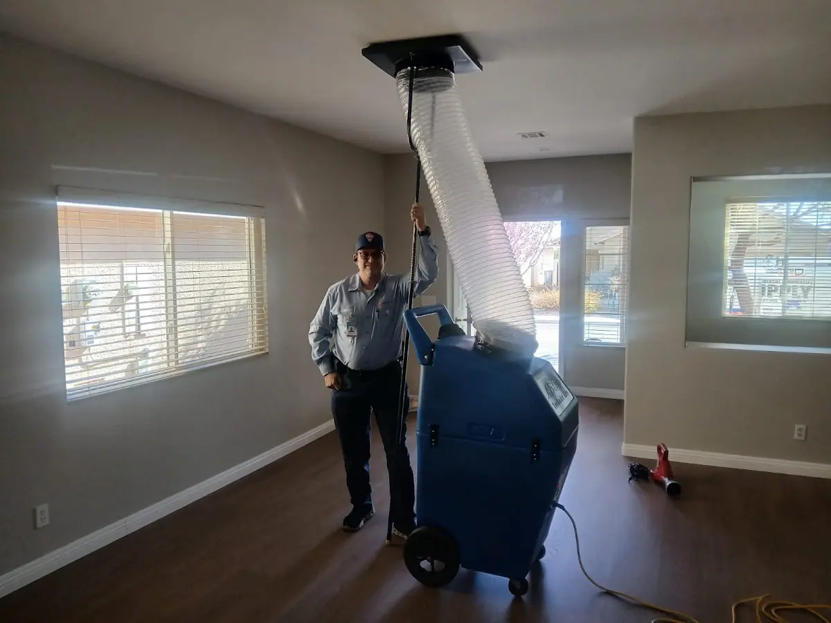 Professional Dryer Vent Cleaning work inside a Denair home